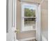 Bathroom window with blinds and a view to the outdoors and a white shower curtain at 3665 Evonvale Gln, Cumming, GA 30041