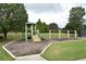 Community outdoor amenity includes a playground, swings and grassy area, providing recreation and enjoyment for residents of all ages at 3665 Evonvale Gln, Cumming, GA 30041