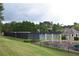 Outdoor tennis courts with playground at 3665 Evonvale Gln, Cumming, GA 30041