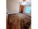 A cozy bedroom featuring a neutral color scheme and natural light streaming through a window at 3735 Fir Dr, Buford, GA 30518