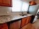 Kitchen sink featuring granite countertops and stainless steel appliances at 3735 Fir Dr, Buford, GA 30518
