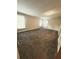 An inviting living room with neutral walls, carpet, and natural light at 3735 Fir Dr, Buford, GA 30518