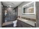 Modern bathroom featuring a glass-enclosed shower, stylish vanity, and sleek fixtures at 860 Peachtree Ne St # 1417, Atlanta, GA 30308
