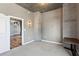 Neutral bedroom featuring concrete support, hardwood floors and a door to another room at 860 Peachtree Ne St # 1417, Atlanta, GA 30308