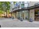 Elegant building entrance featuring a covered entryway and well-maintained sidewalk at 860 Peachtree Ne St # 1417, Atlanta, GA 30308