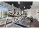 Modern fitness center featuring state-of-the-art treadmills with city views at 860 Peachtree Ne St # 1417, Atlanta, GA 30308