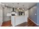 Open kitchen layout with a large island, modern cabinetry, and stainless steel appliances at 860 Peachtree Ne St # 1417, Atlanta, GA 30308