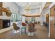 Spacious lounge with a fireplace, ample seating, and large windows offering plenty of natural light and community views at 860 Peachtree Ne St # 1417, Atlanta, GA 30308