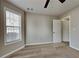 Cozy bedroom with plush carpet, neutral paint, and bright window at 1550 Royale Castle Dr, Lawrenceville, GA 30043