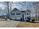 Charming two-story home featuring an attached two-car garage and a well-maintained front yard at 1550 Royale Castle Dr, Lawrenceville, GA 30043