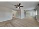 Living room featuring neutral carpet, neutral walls and natural light at 1550 Royale Castle Dr, Lawrenceville, GA 30043