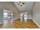 Bright and airy living room with hardwood floors, vaulted ceiling, and ample natural light at 1550 Royale Castle Dr, Lawrenceville, GA 30043