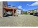 Large backyard featuring a deck and stair access to the yard, perfect for outdoor activities and gatherings at 2705 Fox Hunt Way, Cumming, GA 30041