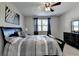 The spacious bedroom offers soft carpet, natural light, and plenty of storage at 2705 Fox Hunt Way, Cumming, GA 30041