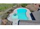 Aerial view of a uniquely shaped community pool with a mushroom water feature, offering a refreshing amenity at 2705 Fox Hunt Way, Cumming, GA 30041