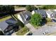 Aerial view of a home nestled in a suburban neighborhood, featuring a well-maintained lawn at 2984 Gayle Manor Ln, Snellville, GA 30078