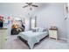 Bedroom with closet, vaulted ceiling and a window, creating a cozy and inviting space at 2984 Gayle Manor Ln, Snellville, GA 30078