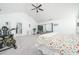 Bright main bedroom features vaulted ceilings, cozy seating area, and exercise equipment at 2984 Gayle Manor Ln, Snellville, GA 30078