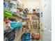 Spacious pantry with wire shelving perfect for organized storage of food items at 2984 Gayle Manor Ln, Snellville, GA 30078