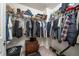 Walk-in closet with ample storage, shelving, and organized hanging space at 2984 Gayle Manor Ln, Snellville, GA 30078