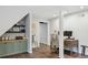 Finished basement with a desk, shelving and under stair storage at 389 Valley Brook Ne Dr, Atlanta, GA 30342