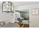 This formal dining room has an adjacent living room, chair rail, and hardwood floors at 389 Valley Brook Ne Dr, Atlanta, GA 30342
