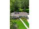 Aerial view of a charming one-story home with a well-manicured front yard and walkway at 389 Valley Brook Ne Dr, Atlanta, GA 30342