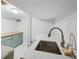 Laundry room features a large marble sink, new washer and dryer, and built-in cabinetry at 389 Valley Brook Ne Dr, Atlanta, GA 30342