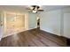 Inviting living room with sleek flooring and neutral walls, leading to dining and kitchen areas at 398 Windy Hill Se Rd, Marietta, GA 30060