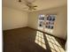 Bedroom featuring French doors, neutral carpet, and ceiling fan at 4485 Golf Vista Cir, Decatur, GA 30035