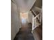Entryway with wood-look flooring, stairs, and ample closet space at 4485 Golf Vista Cir, Decatur, GA 30035