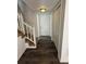 Entryway featuring wood-look floors, a front door, stairs, and closet at 4485 Golf Vista Cir, Decatur, GA 30035