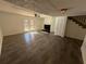 Living room featuring a fireplace, wood-look flooring, and access to the backyard at 4485 Golf Vista Cir, Decatur, GA 30035
