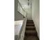 A carpeted stairway with white railings leads to the upper level at 4485 Golf Vista Cir, Decatur, GA 30035