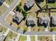 An overhead shot highlights properties with well-kept landscaping and inviting outdoor spaces at 4735 Belcrest Way, Cumming, GA 30040
