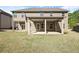 Large backyard featuring a covered patio, perfect for outdoor entertaining and relaxation at 4735 Belcrest Way, Cumming, GA 30040