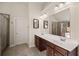 Bright bathroom with double sink vanity, large mirror, and a separate shower at 4735 Belcrest Way, Cumming, GA 30040