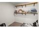 Organized closet space with wooden shelving and ample storage for personal items at 4735 Belcrest Way, Cumming, GA 30040