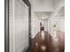 Elegant entryway with hardwood floors, white trim, and a view of the living room at 4735 Belcrest Way, Cumming, GA 30040