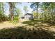 Lush backyard with mature trees, perfect for outdoor activities and relaxation at 1333 Briar Ridge Ln, Jonesboro, GA 30238