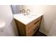 Bathroom features a light wood vanity with white sink and modern fixtures at 1333 Briar Ridge Ln, Jonesboro, GA 30238