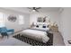 Stylish bedroom with modern decor, a comfortable bed, and ample natural light for relaxation at 1333 Briar Ridge Ln, Jonesboro, GA 30238