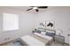 Cozy staged bedroom featuring a queen-size bed with simple decor and neutral colors at 1333 Briar Ridge Ln, Jonesboro, GA 30238