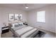 Bright bedroom features neutral decor with a queen-size bed and two side tables at 1333 Briar Ridge Ln, Jonesboro, GA 30238