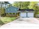 Charming two-story home with a spacious driveway and a convenient two-car garage at 1333 Briar Ridge Ln, Jonesboro, GA 30238