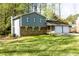 Two-story house with brick and siding, features a two-car garage and a porch at 1333 Briar Ridge Ln, Jonesboro, GA 30238