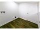 Laundry Room features faux-wood floors with hookups for a washer and dryer at 1333 Briar Ridge Ln, Jonesboro, GA 30238