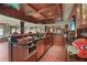 Finished basement bar with granite counters, stainless appliances, and wood cabinetry at 2016 Westbourne Way, Johns Creek, GA 30022