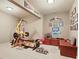 Exercise room with weight training equipment and sports decor at 2016 Westbourne Way, Johns Creek, GA 30022