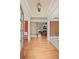 Inviting foyer with hardwood floors flows into a living area with a fireplace at 2016 Westbourne Way, Johns Creek, GA 30022